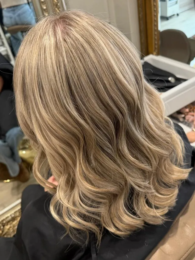 Seamless blonde, foiled and toned, in loose waves
