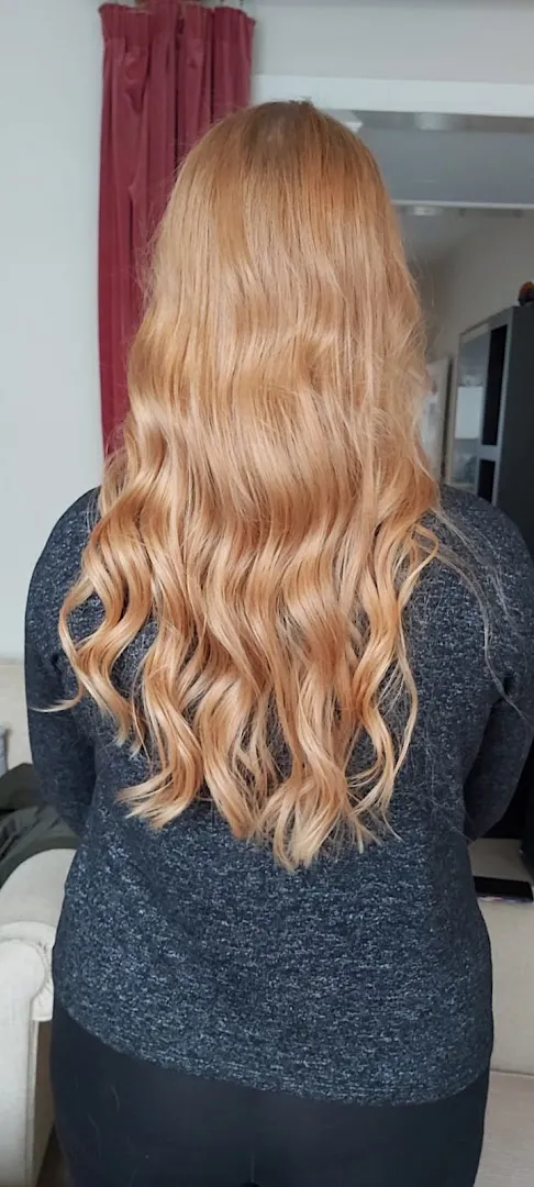 Caramel and honey blonde, long and waved