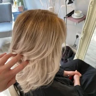 Soft, layered blonde lob